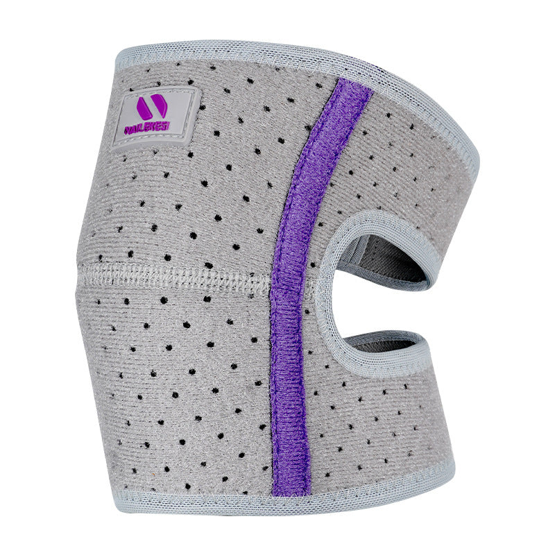 The baby is crawling with knee pads