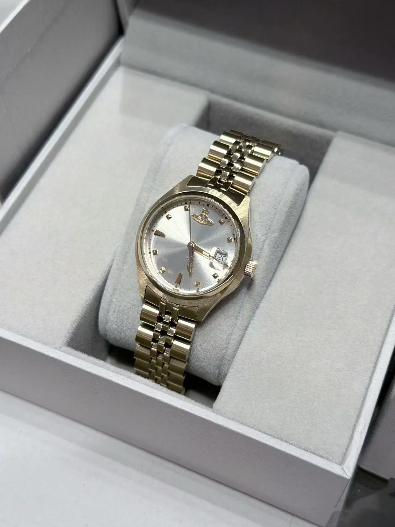 Pearl-set diamond style Saturn watch
