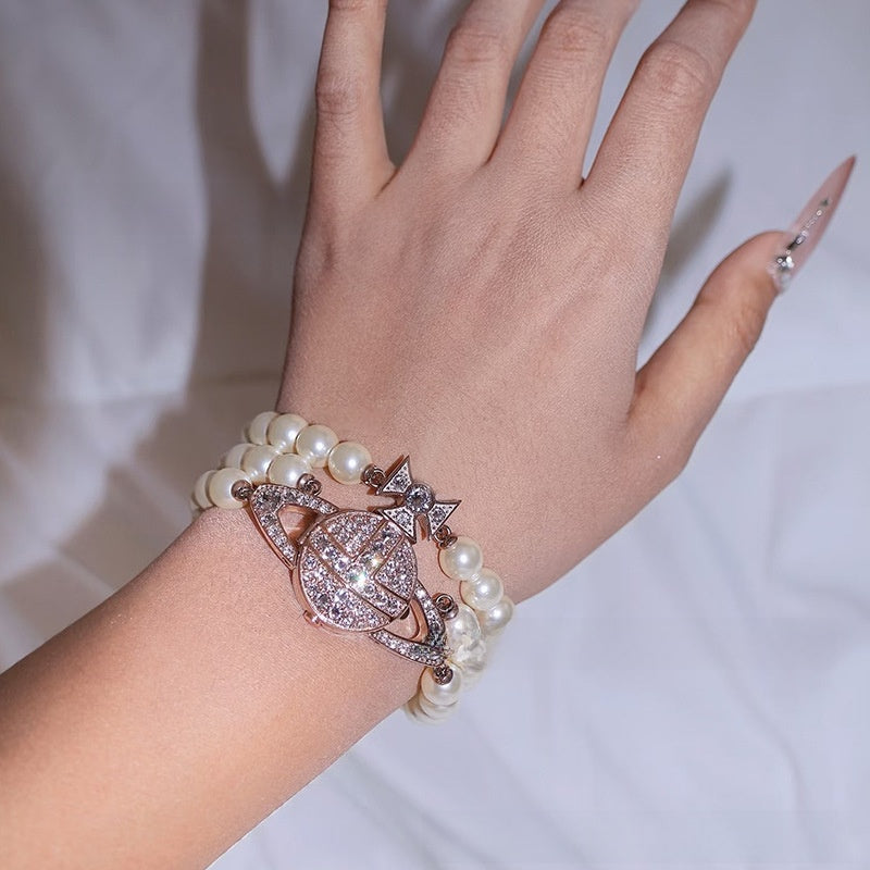 Pearl-set diamond style Saturn watch