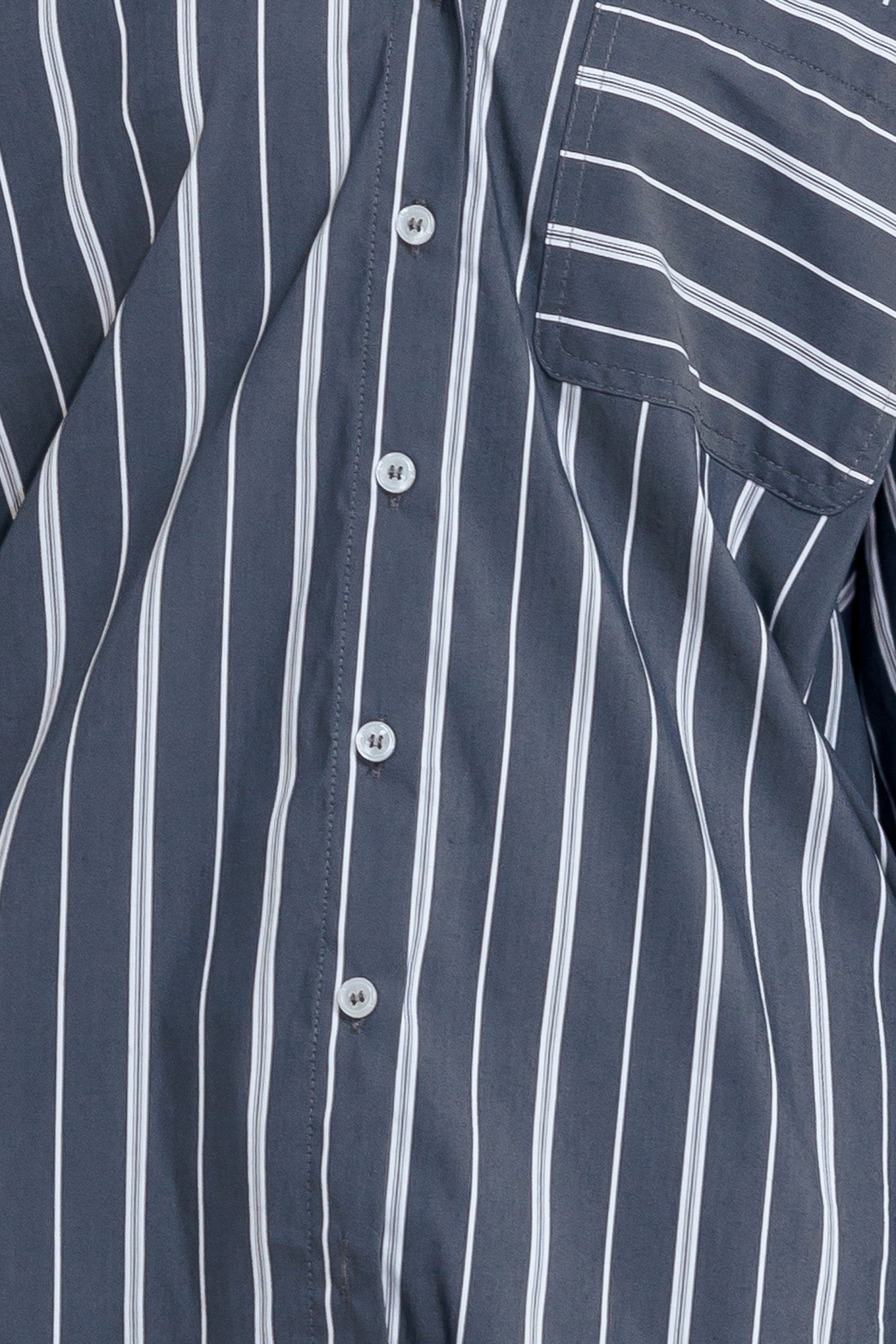 BEHIND THE GRIN WOVEN TOP