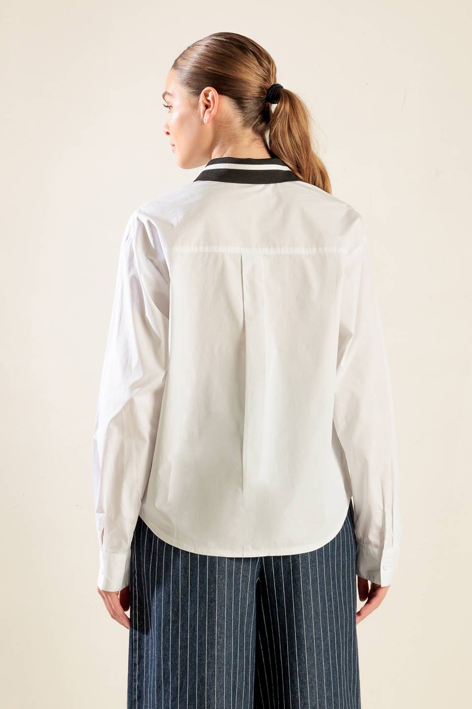 CAUSE A COMMOTION WOVEN TOP