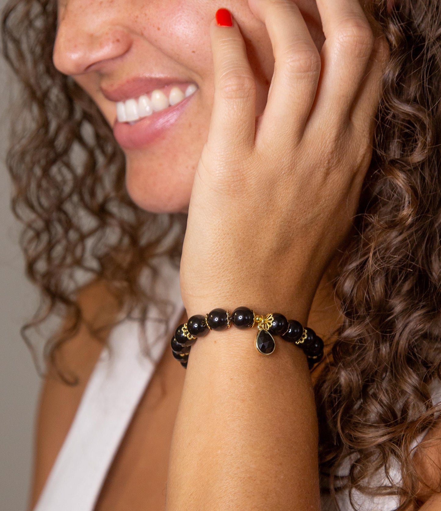 Black Onyx Gold Tone Beaded Stretch Bracelet