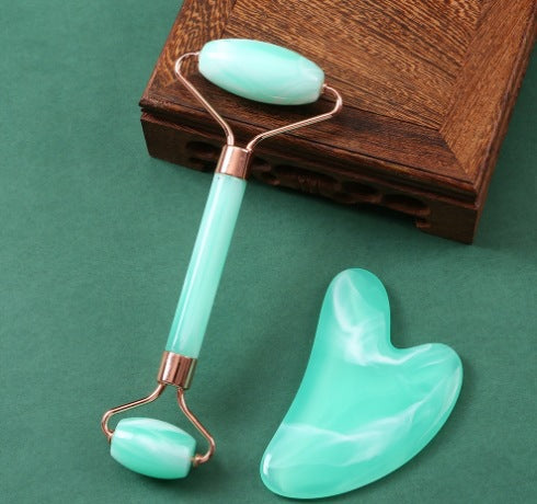 Heart-shaped crystal roller massage board