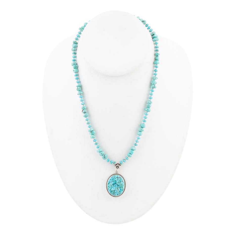 Carved Blue Turquoise and Sterling Silver Pendant