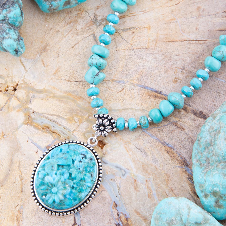 Carved Blue Turquoise and Sterling Silver Pendant