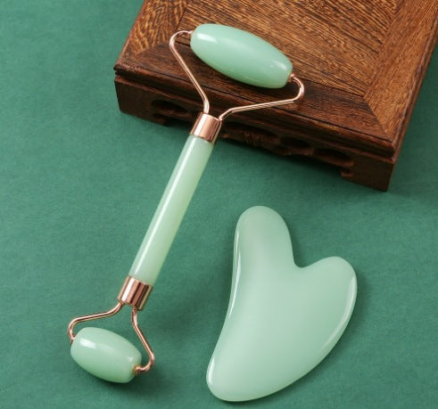 Heart-shaped crystal roller massage board